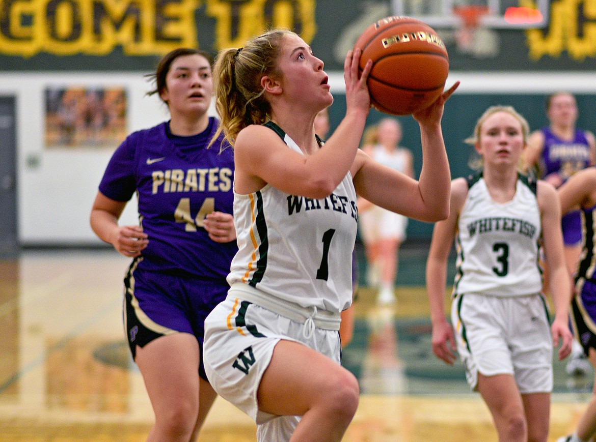 Bulldog Brooke Roberts goes for a layup against Polson on Friday night in Whitefish. (Whitney England/Whitefish Pilot)