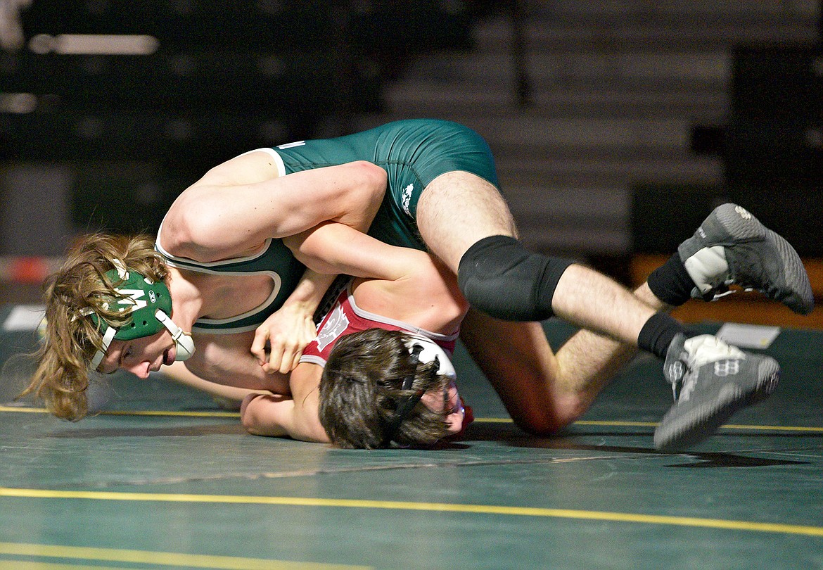 Bulldog Kadin Brown wrestles Hamilton in a dual on Thursday at Whitefish High School. (Whitney England/Whitefish Pilot)