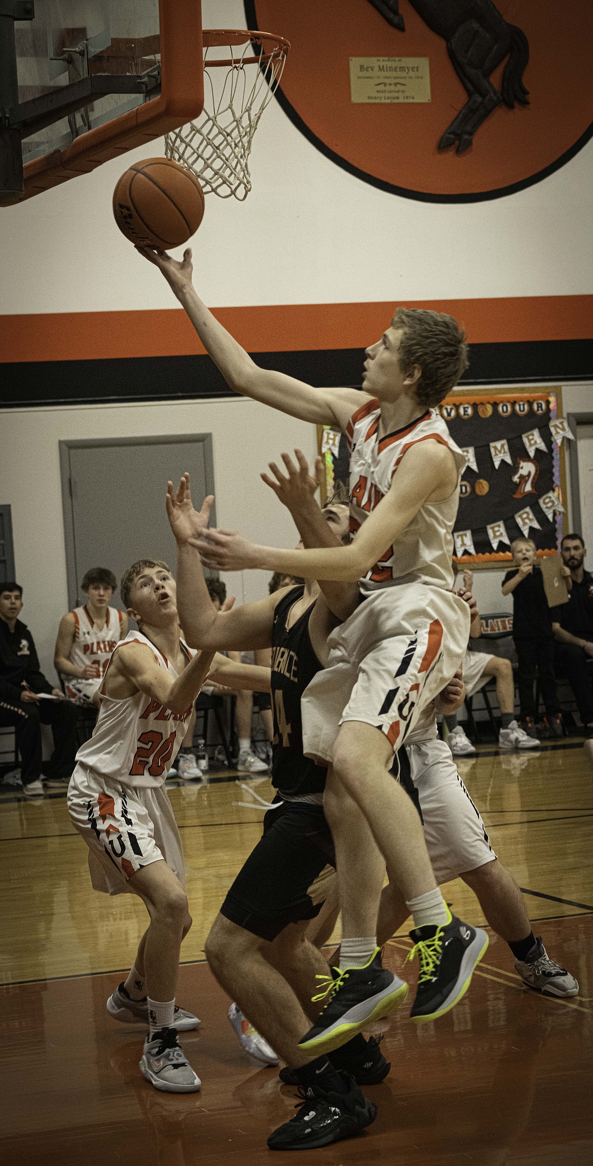 Plains Cody Anderson makes a layup against Florence. (Tracy Scott/Valley Press)