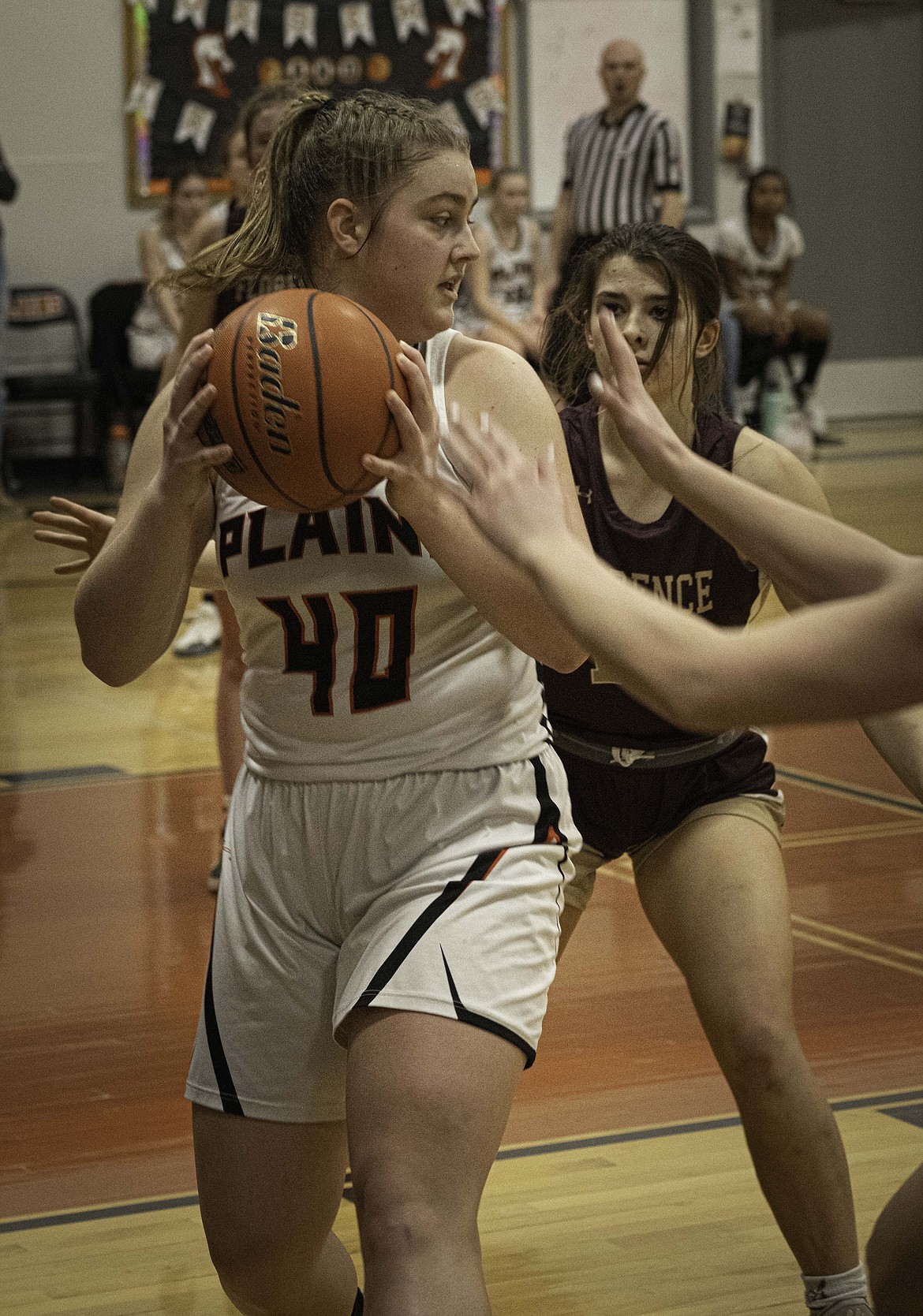 Plains Lexie Deming pulls down a rebound against Florence. (Tracy Scott/Valley Press)