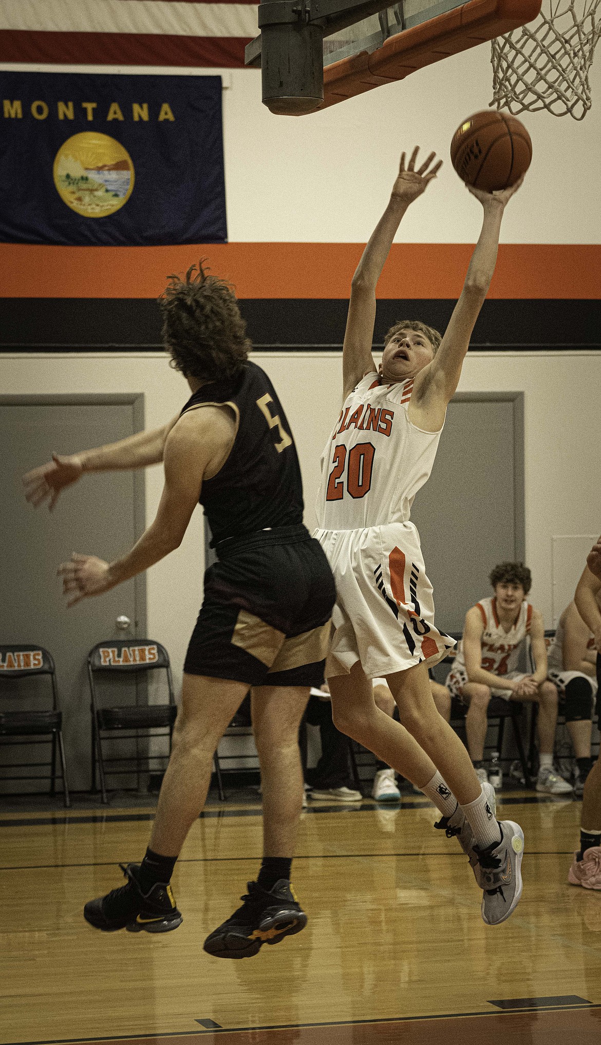 Plains' Wyatt Butcher goes up for a bucket against Florence. (Tracy Scott/Valley Press)