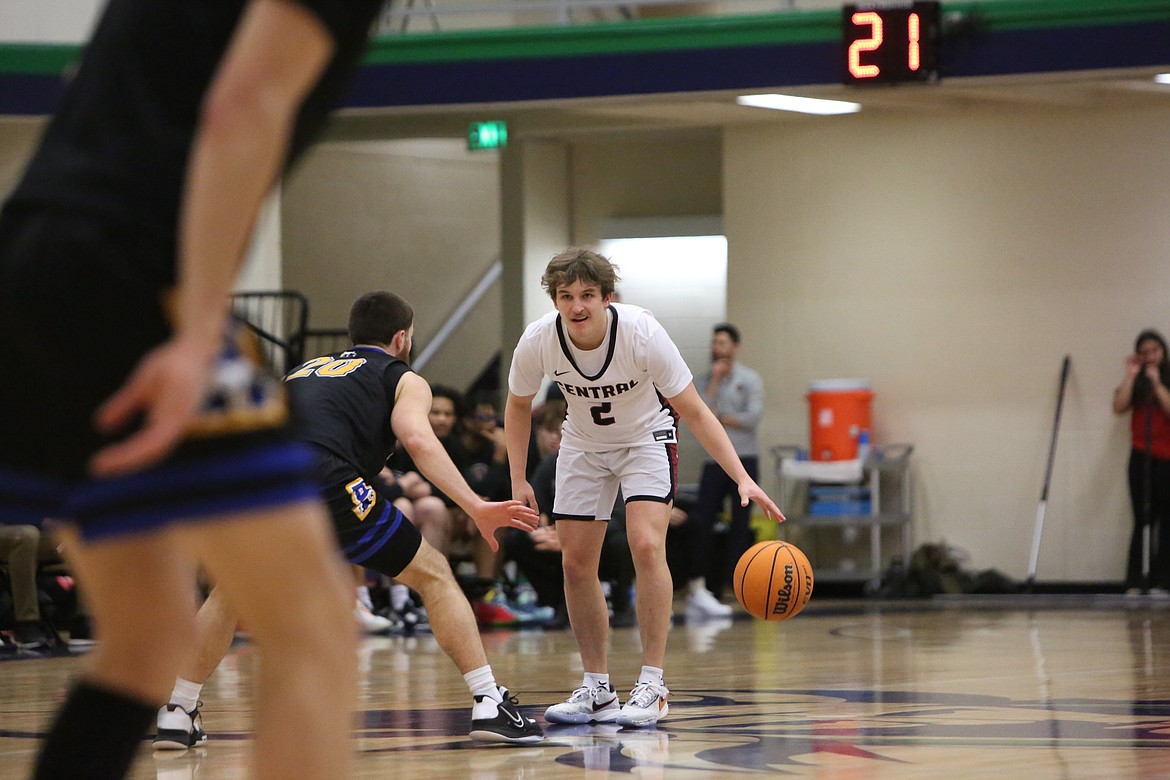 Central Washington point guard Brock Gilbert looks for an open lane during the first half of the Wildcat’s 78-66 win over Alaska Fairbanks on Saturday.