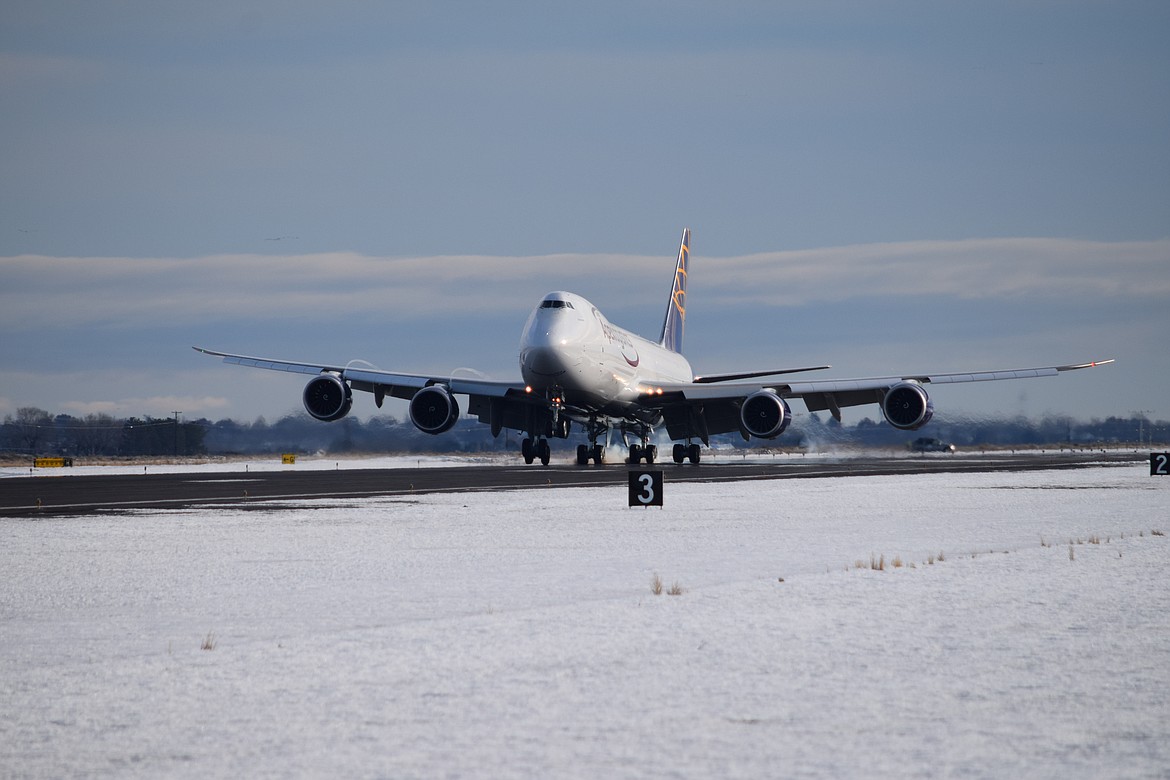 The last 747 built by Boeing, a 747-8F being delivered to New York-based cargo airline Atlas Air, touches down briefly at the Grant County International Airport on Tuesday. During a 54-year production run that ended in 2022, Boeing built over 1,500 747s, according to a company statement.