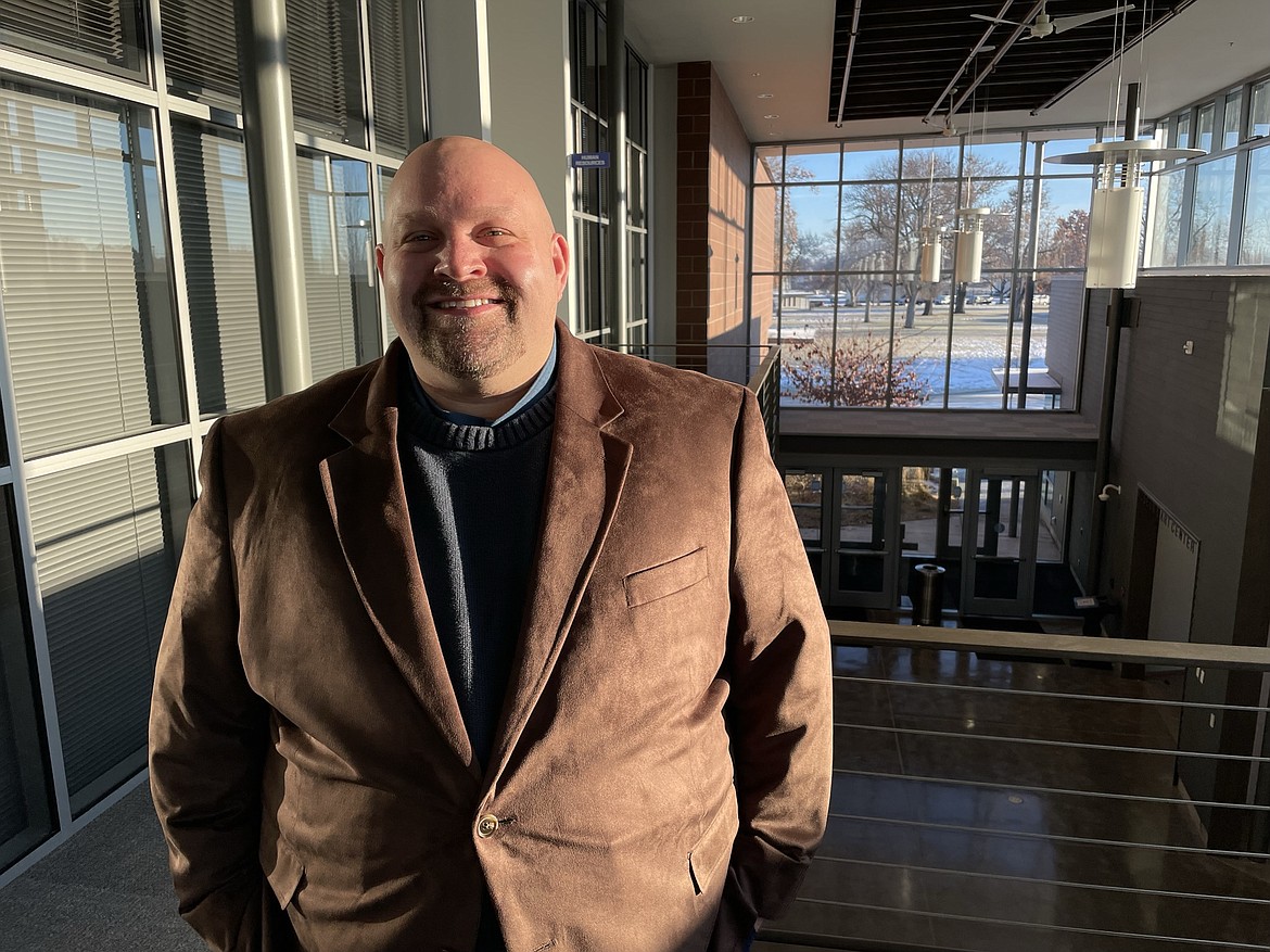 Moses Lake Assistant City Manager Rich Huebner inside the city’s Civic Center on Tuesday. Huebner said he originally went to Washington State University to become a sportscaster.