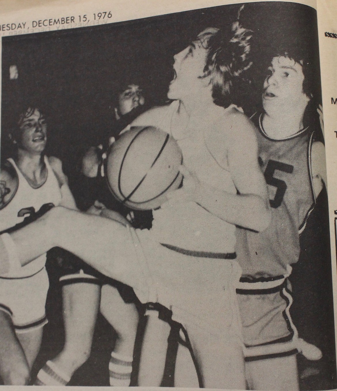 Viking Bill Dontigny heads for the hoop with Fred Hansen ready to follow up. During this 1976 season, Bigfork beat Eureka twice the previous weekend. (photo courtesy of Glacier Herald)