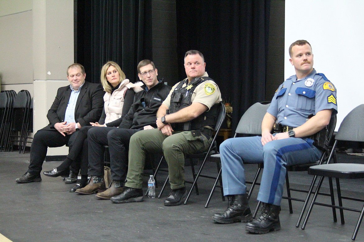 From left, Grant County Prosecutor Kevin McCrae, Grant County Commissioners Cindy Carter and Danny Stone, Grant County Sheriff Joey Kriete and Washington State Patrol Sergeant Aaron Nelson answered questions from Mattawa-area residents during a Law Enforcement Appreciation event Monday.