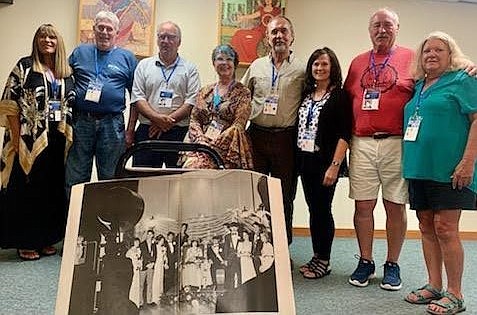 In 2022, CHS royalty reprise their Life magazine pose (from left, using maiden names): Heather Harris, Dick Fields, Craig Plumlee, Queen Susie Phelps, Bob Tilla, Shari Gerhardt, Harry Pollard and Chris Riggs.