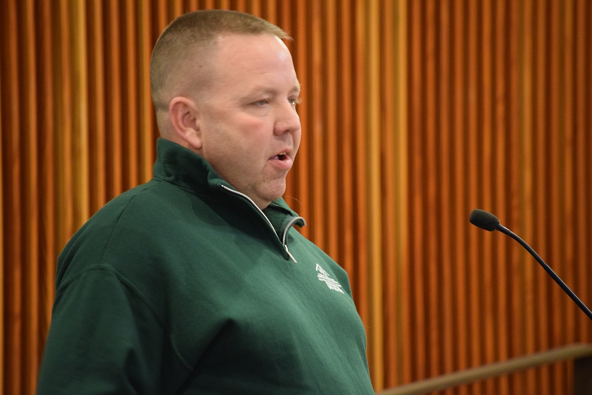 Home Electrical Services owner James Anderson speaks at Tuesday’s Moses Lake City Council meeting. The council honored Anderson and his family for their support of the city’s sleep center, which provides area homeless with a place to sleep.