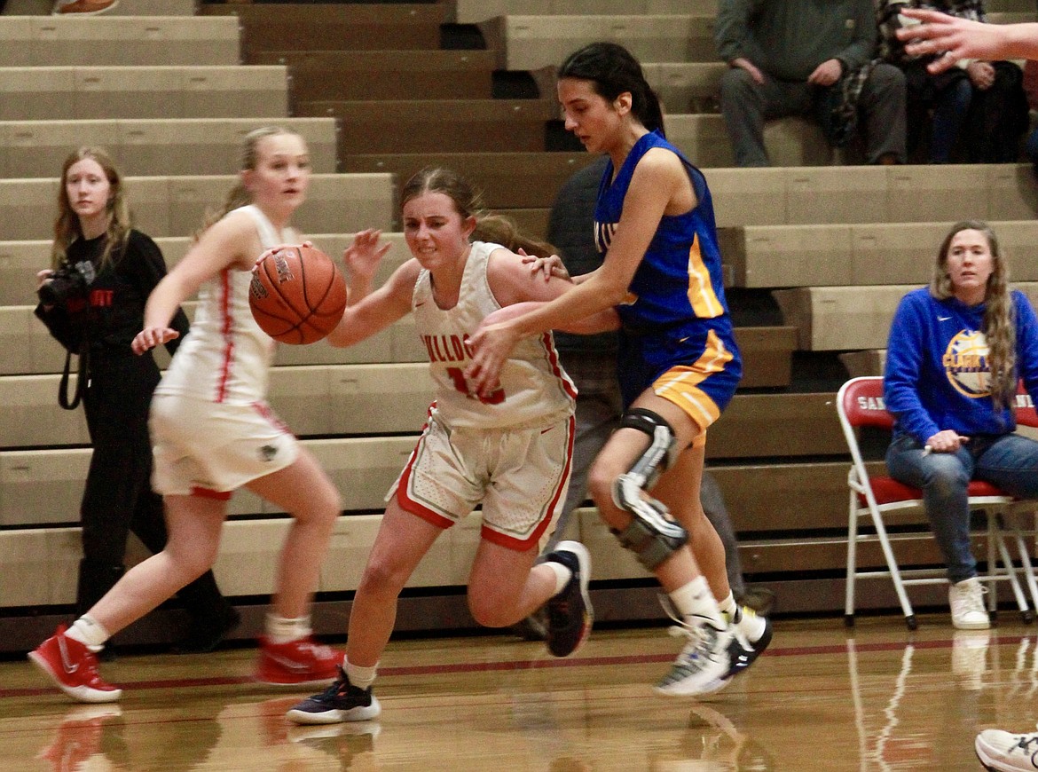 Taylor Mire works through the Clark Fork defense in Wednesday nights game at Sandpoint.