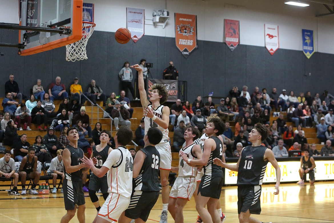 Ephrata junior Hans Roberts rises up against the Grandview defense in the first half of Ephrata’s 60-50 loss to the Greyhounds.