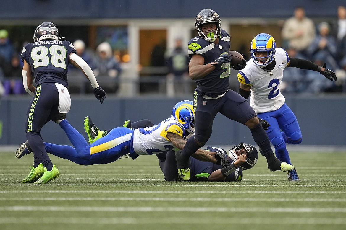 Seattle Seahawks running back Kenneth Walker III became the second rookie in franchise history to finish a season with more than 1,000 rushing yards. Walker ended the regular season with 1,050 rushing yards.