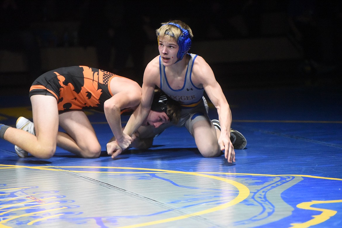 Libby's Marley Erickson beat Eureka's Josh Lamberton in Tuesday's match at 132 pounds. (Scott Shindledecker/The Western News)