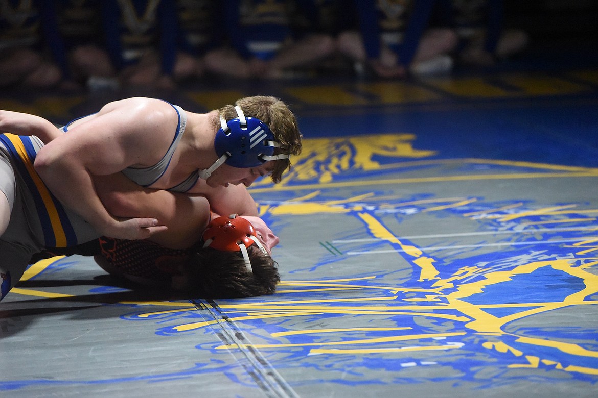 Libby's Matthew Niemi pinned Eureka's Wiatt Hume in Tuesday's match at 182 pounds. (Scott Shindledecker/The Western News)