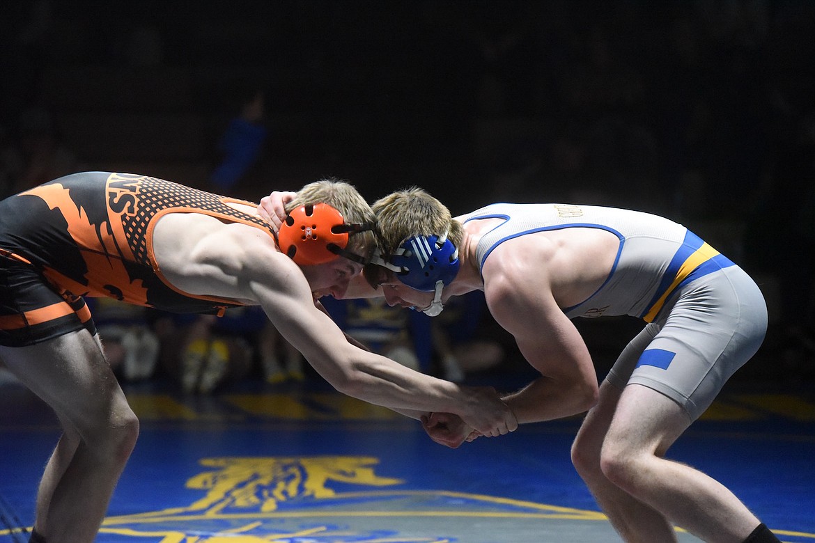 Libby's Zekiah Meyers pinned Eureka's Riley Atchinson in Tuesday's match at 138 pounds. (Scott Shindledecker/The Western News)