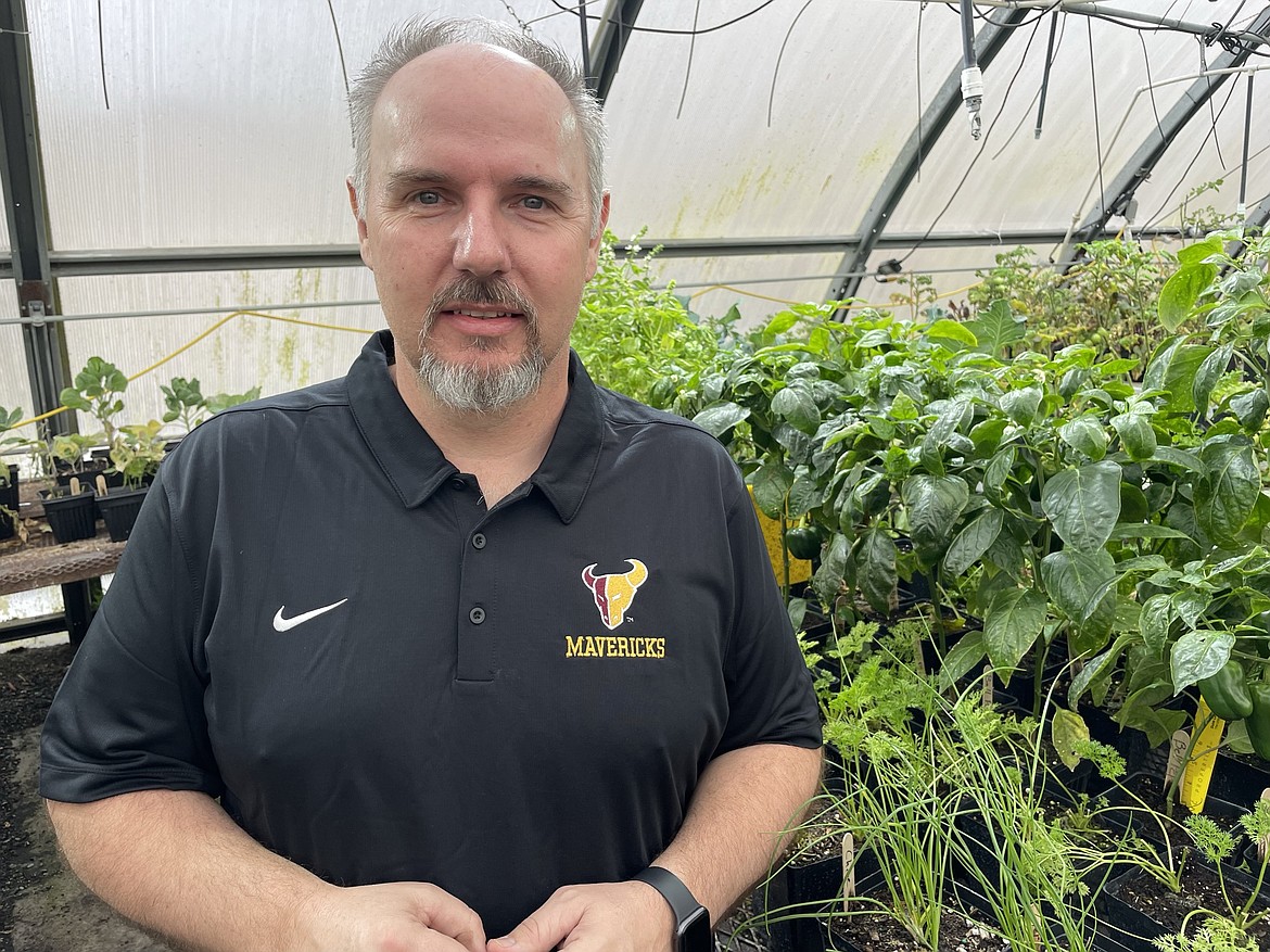 Tony Kern, who has taught ag science and horticulture at Moses Lake High School for the last 23 years, in one of the MLHS greenhouses.