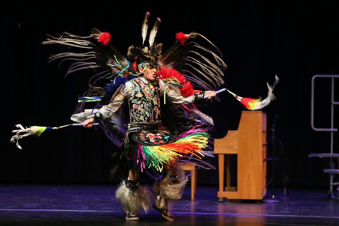 Coeur d'Alene Tribal dancer Jonathan Nomee performs in full regalia Thursday morning during the 36th annual Dr. Martin Luther King, Jr. Human Rights Celebration at the Schuler Performing Arts Center.