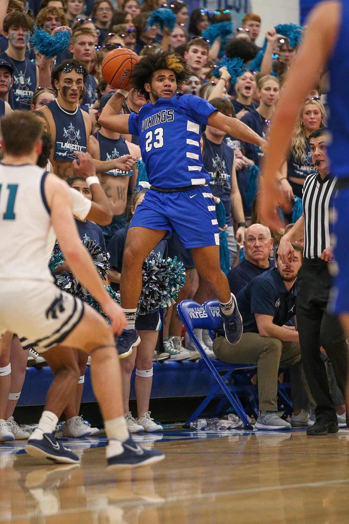 JASON DUCHOW PHOTOGRAPHY
Steven Burgess of Coeur d'Alene tries to save the ball during Friday night's boys Fight for the Fish game with Lake City at Viking Court.