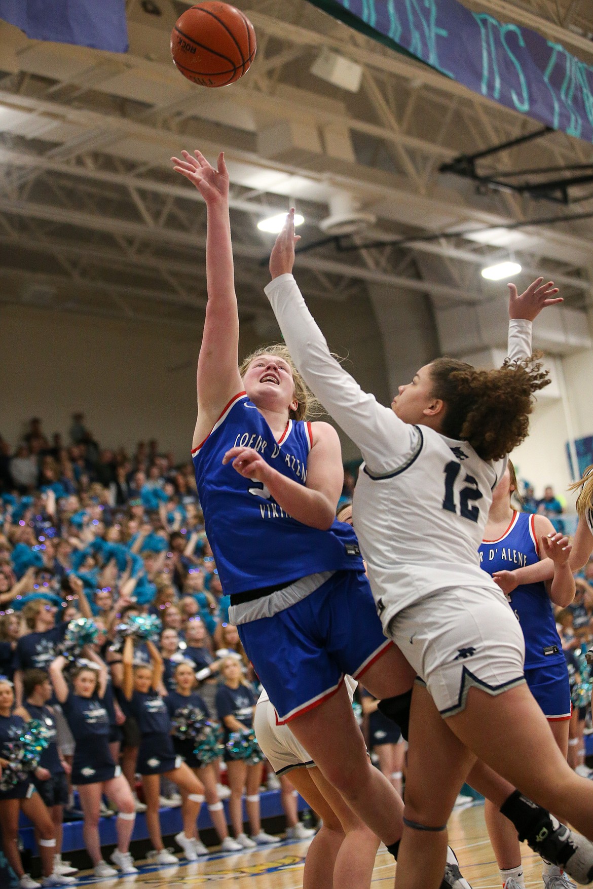 JASON DUCHOW PHOTOGRAPHY
Kelsey Carroll of Coeur d'Alene puts up a shot against Kursten McKellips of Lake City during the girls Fight for the Fish game Friday night at Coeur d'Alene High.