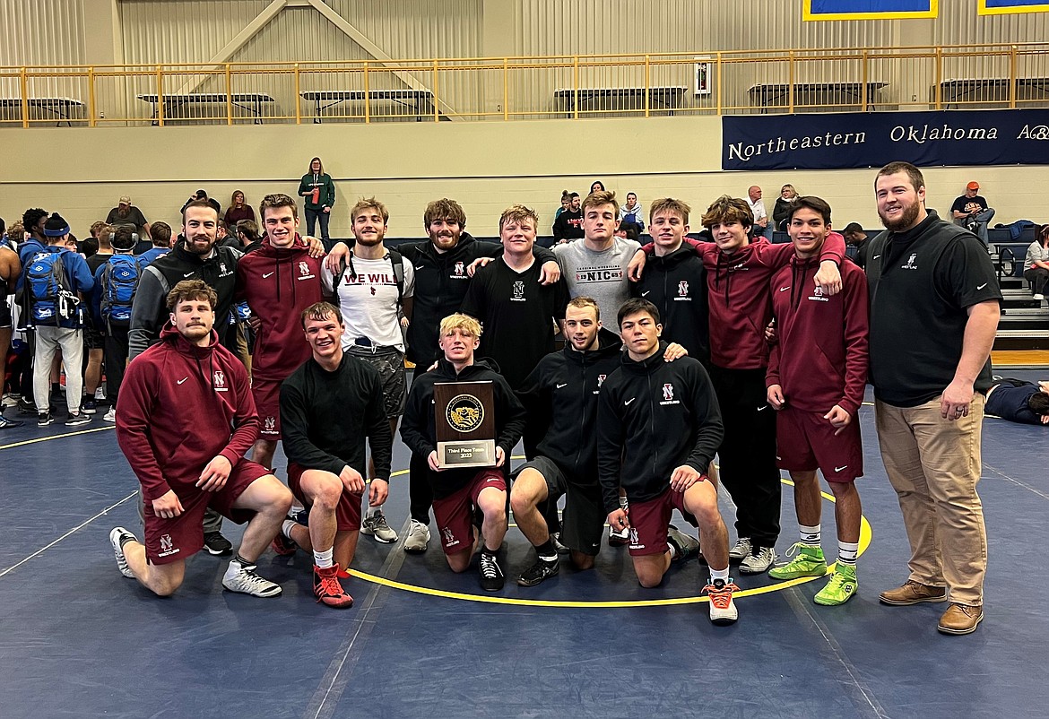 Courtesy photo
The North Idaho College wrestling team finished third in the NJCAA Coaches Duals tournament on Saturday at Northeast Oklahoma A&M. In the back, from left, are coach Derrick Booth, Ben Mitchell, Ledger Petracek, Kaden Krouse, Bradley Whitwright, Ethan Miller, Ryan Graves, Brandon O'Brien, Brant Porter and assistant coach Cooper Thomas. In the front are Kyle Caldwell, Travis Waldner, Kobi Johnson, Lane Reardon and Kanai Tapia.