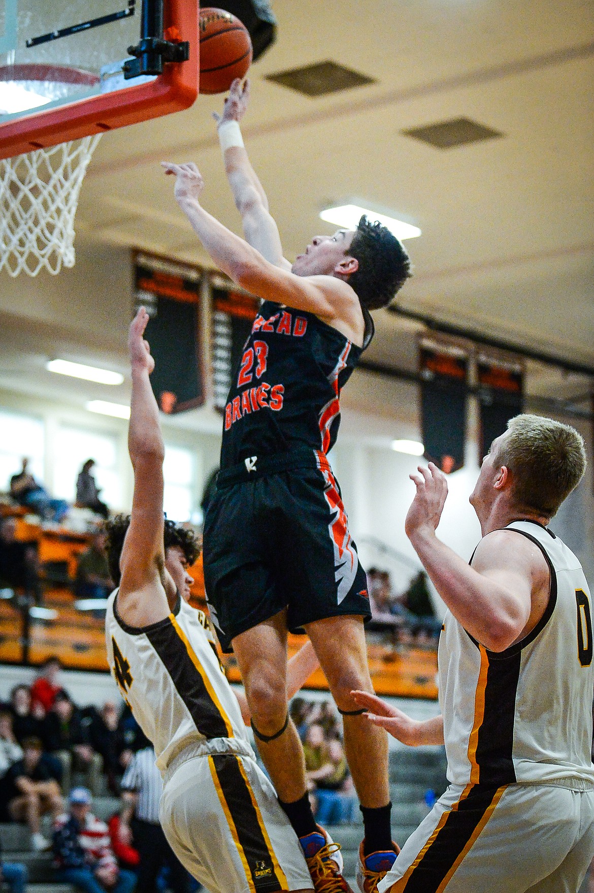 Flathead's Brody Thornsberry (23) drives to the basket in the first quarter against Helena Capital at Flathead High School on Saturday, Jan. 14. (Casey Kreider/Daily Inter Lake)