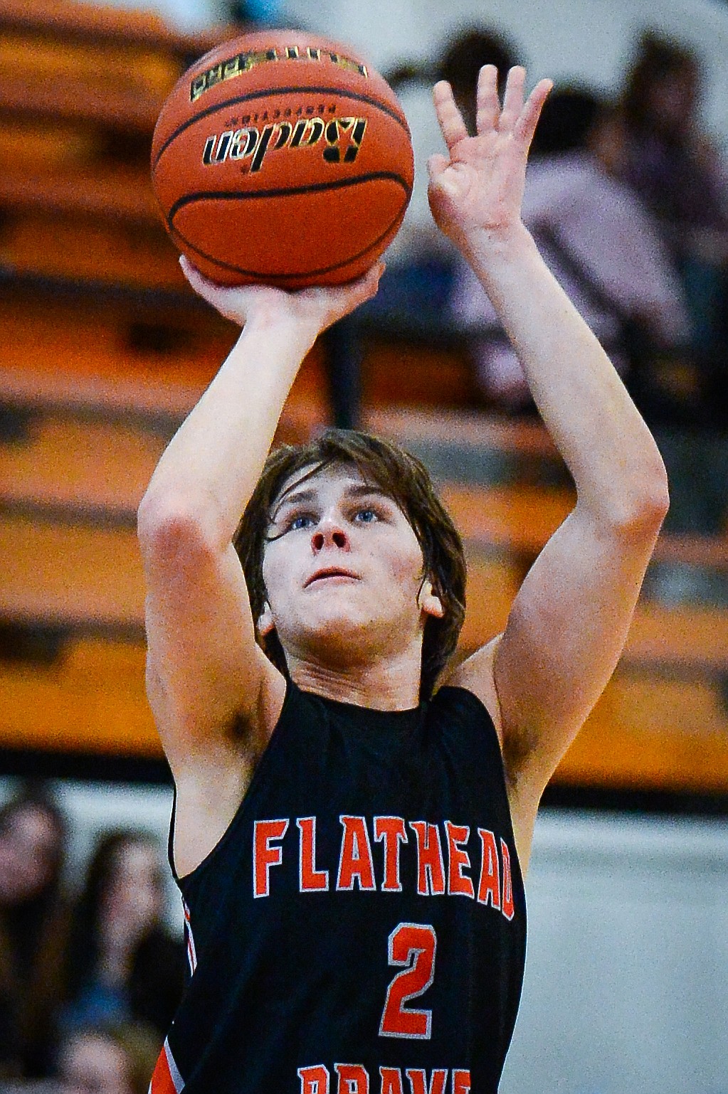 Flathead's Joshua Eagleton (2) squares up for three in the first half against Helena Capital at Flathead High School on Saturday, Jan. 14. (Casey Kreider/Daily Inter Lake)