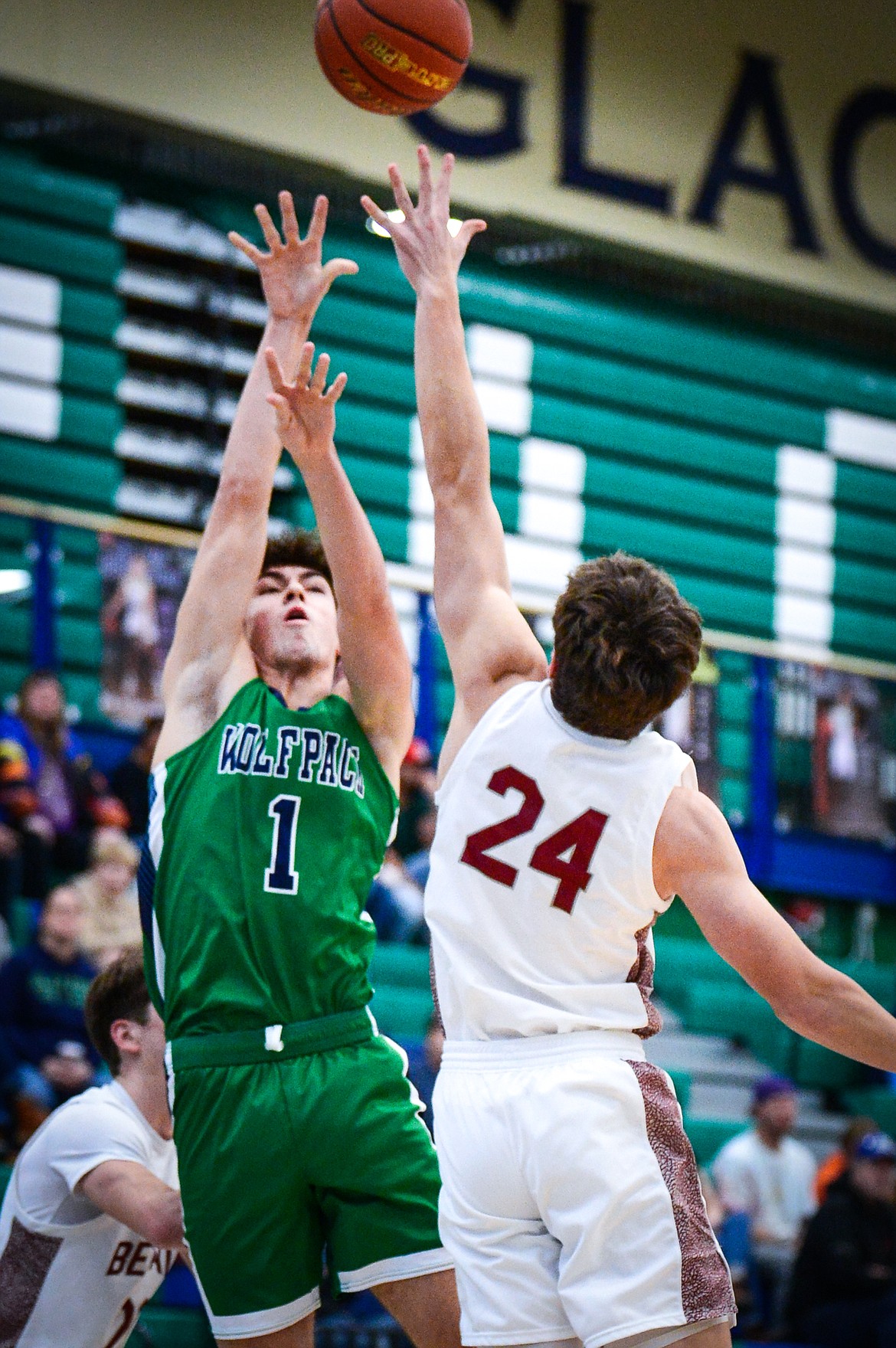 Glacier's Cohen Kastelitz (1) shoots over Helena High's Cael Murgel (24) in the first half at Glacier High School on Friday, Jan. 13. (Casey Kreider/Daily Inter Lake)