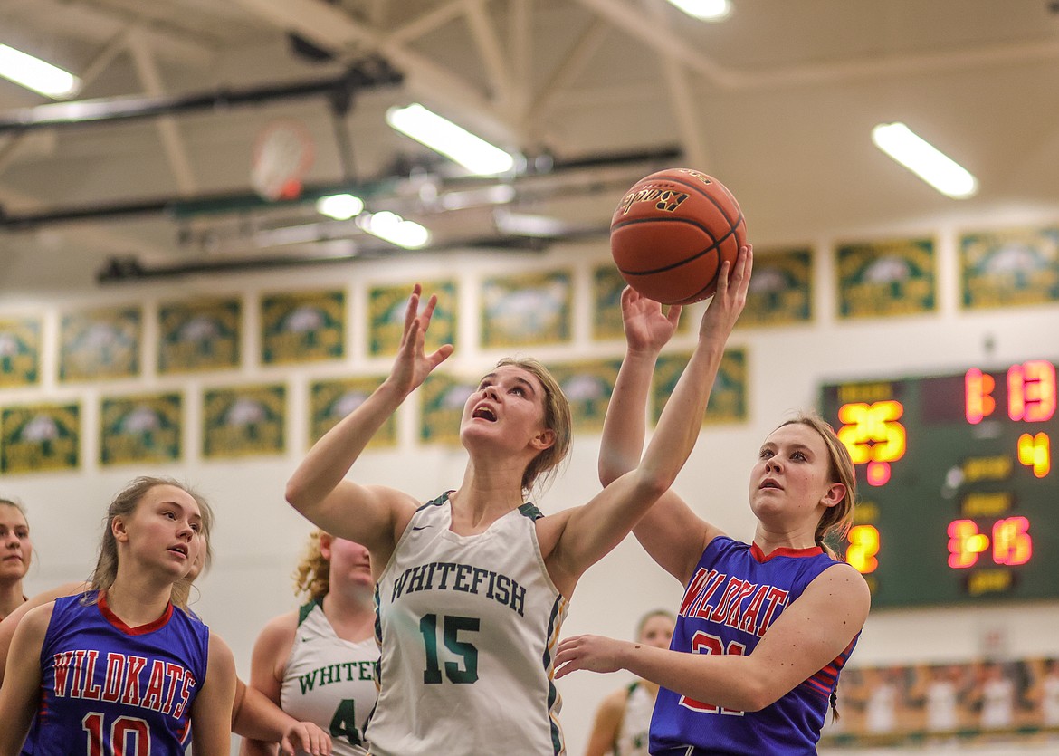 Bulldogs junior Bailey Smith drives to the net on Thursday at home against the Wildkats. (JP Edge/Hungry Horse News)