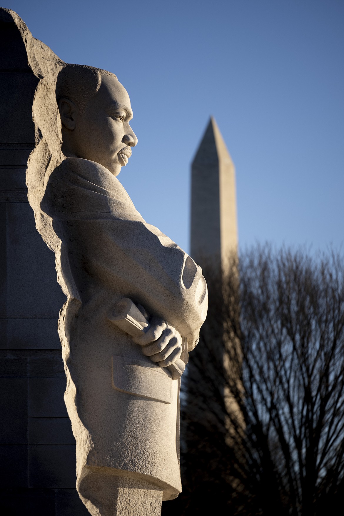 With the Washington Monument in the background, the Martin Luther King, Jr. Memorial is seen on Martin Luther King Jr. Day in Washington, Monday, Jan. 16, 2023. (AP Photo/Andrew Harnik)