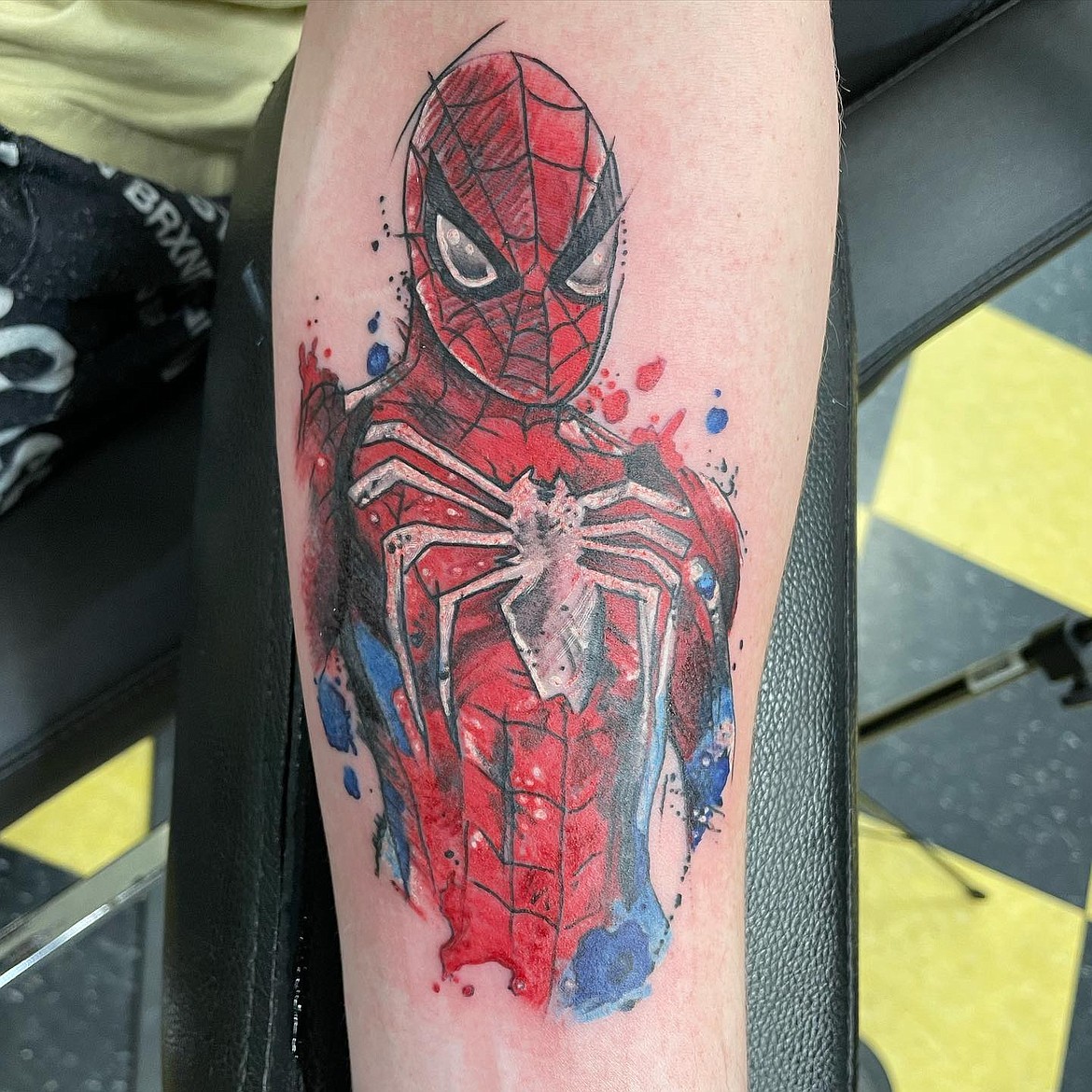 A tattoo completed on Jan. 3 of a watercolor Spiderman.