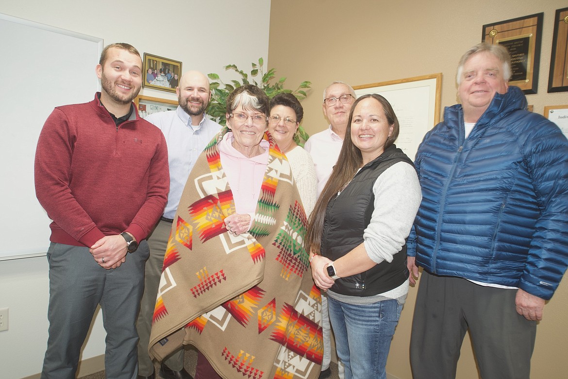 Former and past board members of the Lower Flathead Valley Community Foundation were on hand last Thursday in Ronan to honor retiring executive secretary Carlene Bockman (center). Members (l-r) include Robbie Gauthier, Brennin Grainey, Myrna and Bob Gauthier, Stephanie Gillin, and Mark MacDonald. (Kristi Niemeyer/Leader)