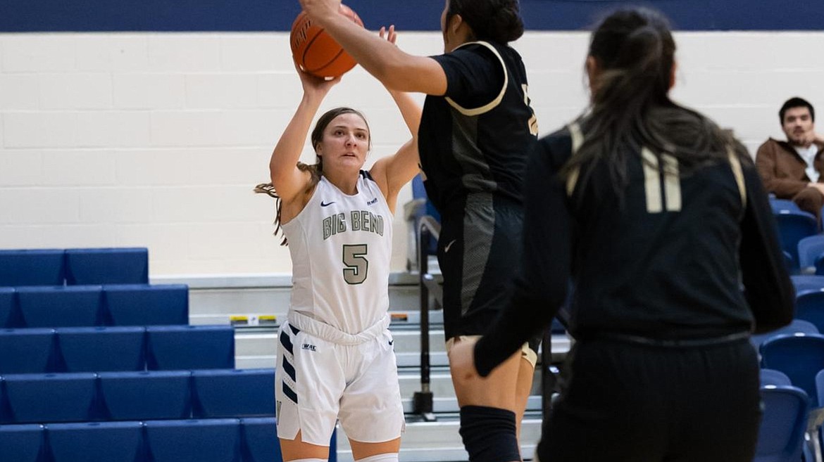 Big Bend sophomore Callie Tolman shoots the ball with a defender in her face. Tolman finished the game with 19 points against the Lady Yaks.