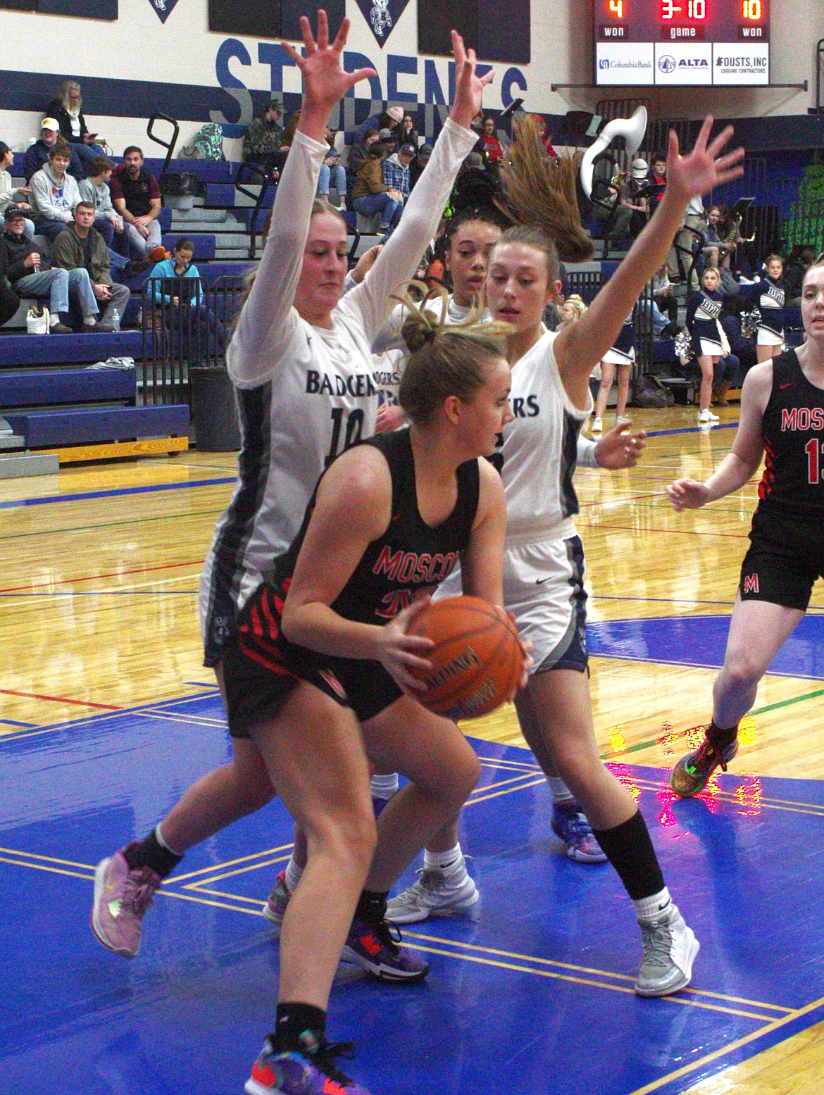 Markynn Pulid and Rylie Kimball play tough defense against Moscow earlier in the season.