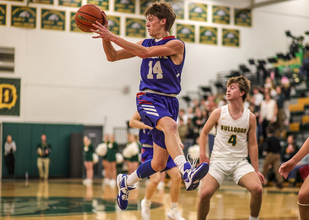 Jace Hill makes a jump pass Thursday night in Whitefish. (JP Edge photo)