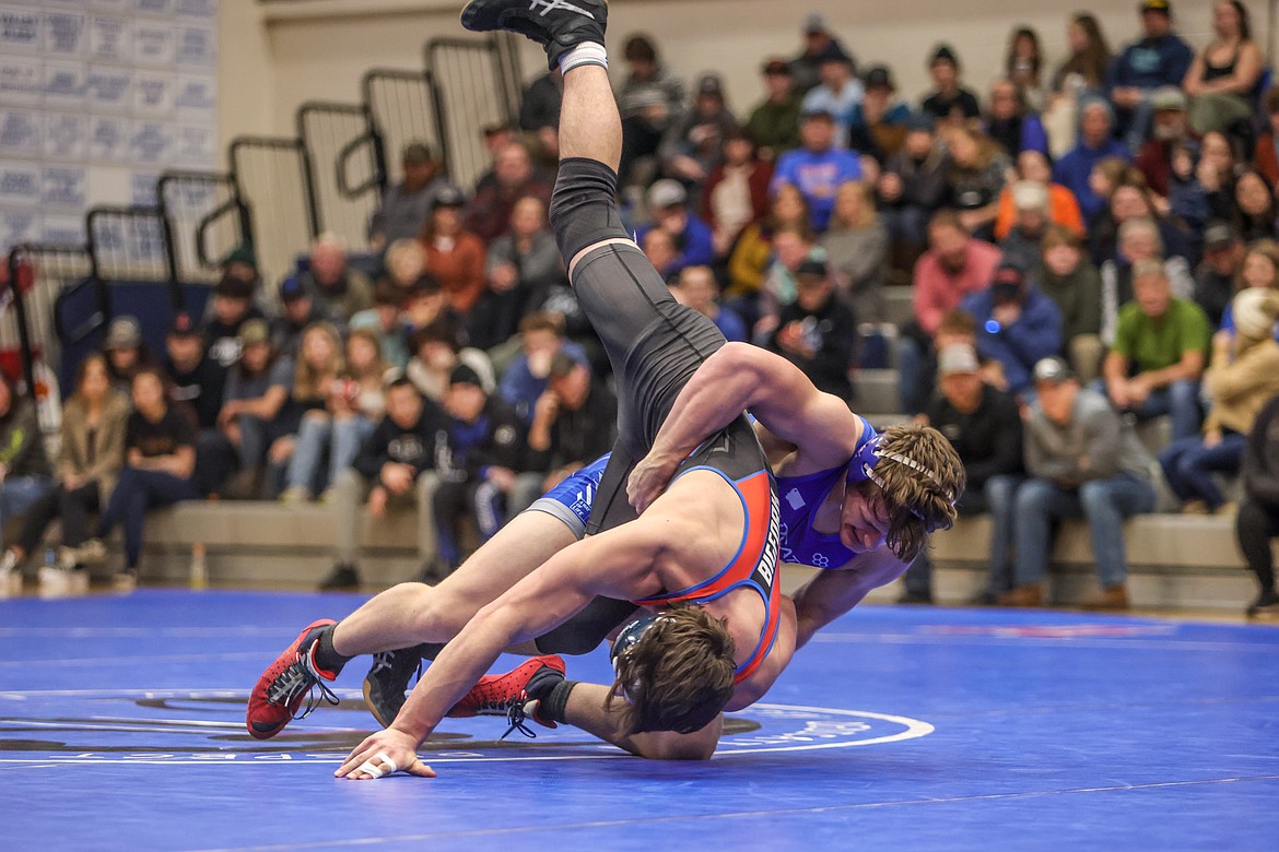 Brandon Role takes down an opponent in the Bigfork duel in Tuesday in Columbia Falls. (JP Edge photo)