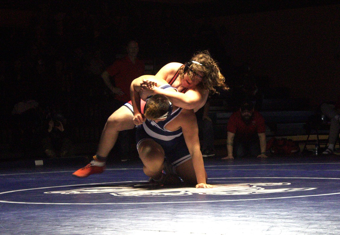 Donnie Riess (285) fights against his Sandpoint at the B-cup on Jan. 17.