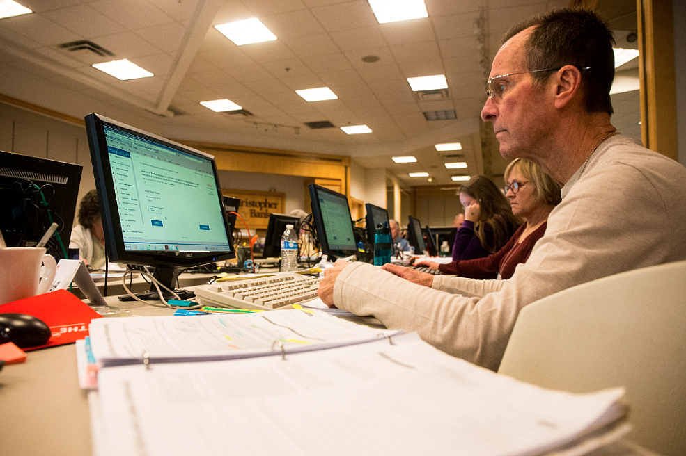 AARP Tax-Aide volunteer Jeff Sherwood follows instructions during a past Tax-Aide training session. The free tax preparation program returns Feb. 1.