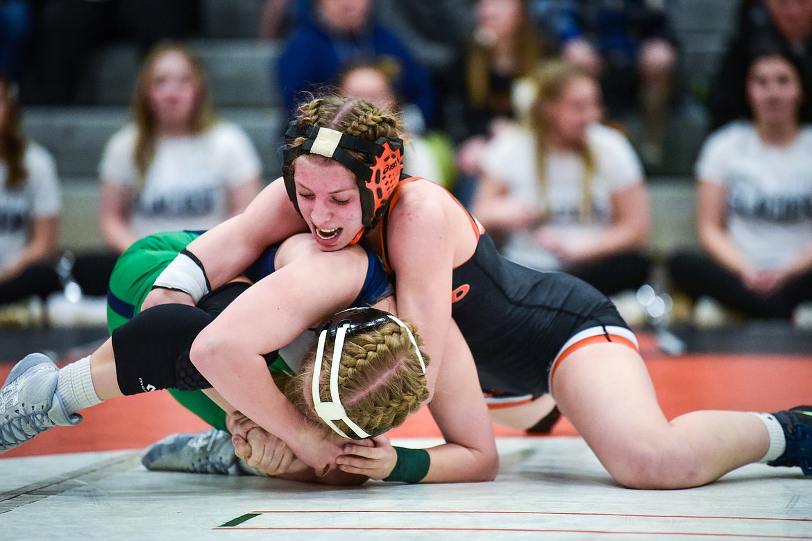 Flathead's Trinity Boivin wrestles Glacier's Temree Payne-Taylor at 120 pounds during crosstown wrestling at Flathead High School on Thursday, Jan. 19. Boivin won by pin. (Casey Kreider/Daily Inter Lake)