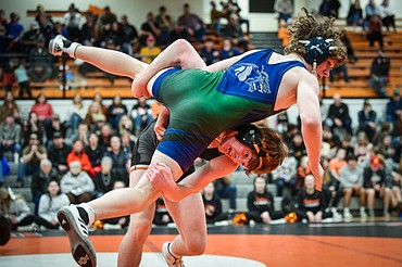 Flathead's Logan Stansberry takes Glacier's Korbin Baldwin to the mat at 145 pounds during crosstown wrestling at Flathead High School on Thursday, Jan. 19. Stansberry won by pin.(Casey Kreider/Daily Inter Lake)