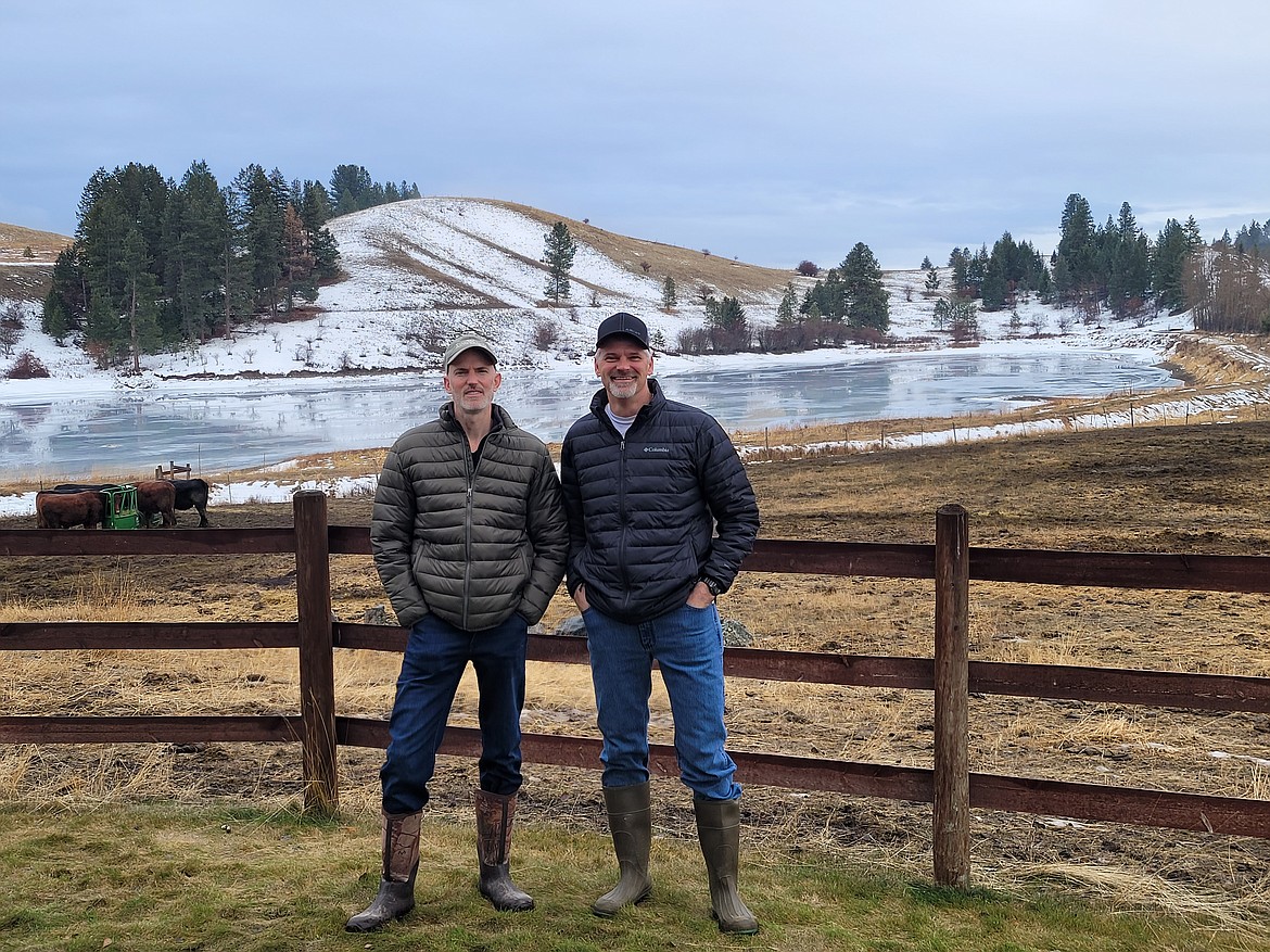 Brothers Eric and Mark Casazza (right) stand on Eric's ranch in Eureka, Montana. Mark has recently launched a trade school to train the next generation of building and agriculture teachers, something he feels is lacking in Montana public schools. (Photo courtesy of Mark Casazza)