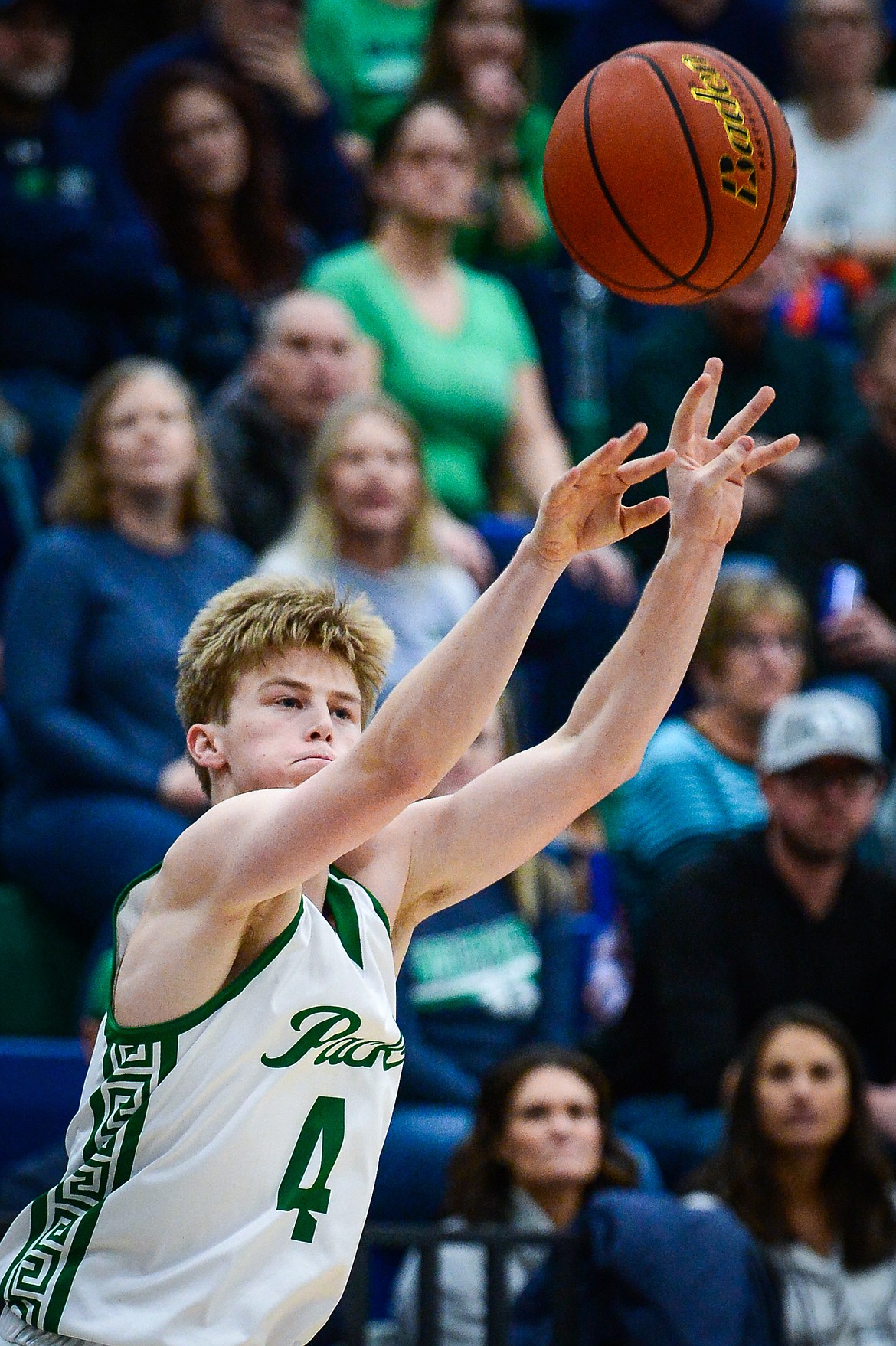 Glacier's Adam Nikunen (4) spots up from three in the first quarter against Flathead during crosstown at Glacier High School on Friday, Jan. 20. (Casey Kreider/Daily Inter Lake)