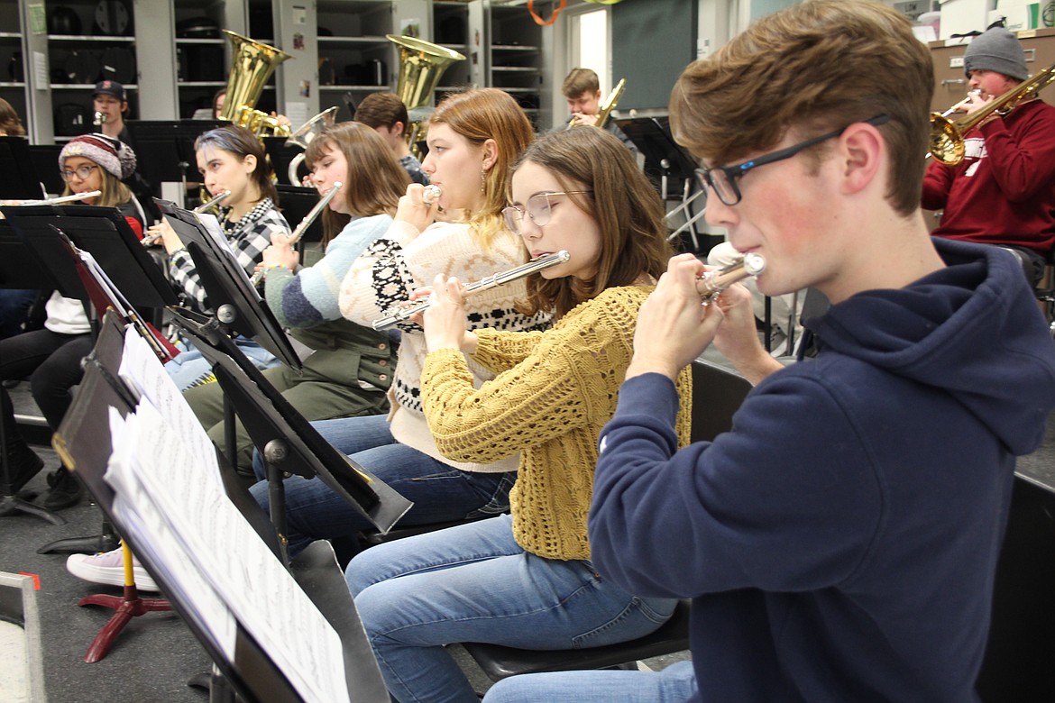 The Moses Lake High School wind ensemble, including the flautists pictured, is raising money for a trip to perform at Carnegie Hall.