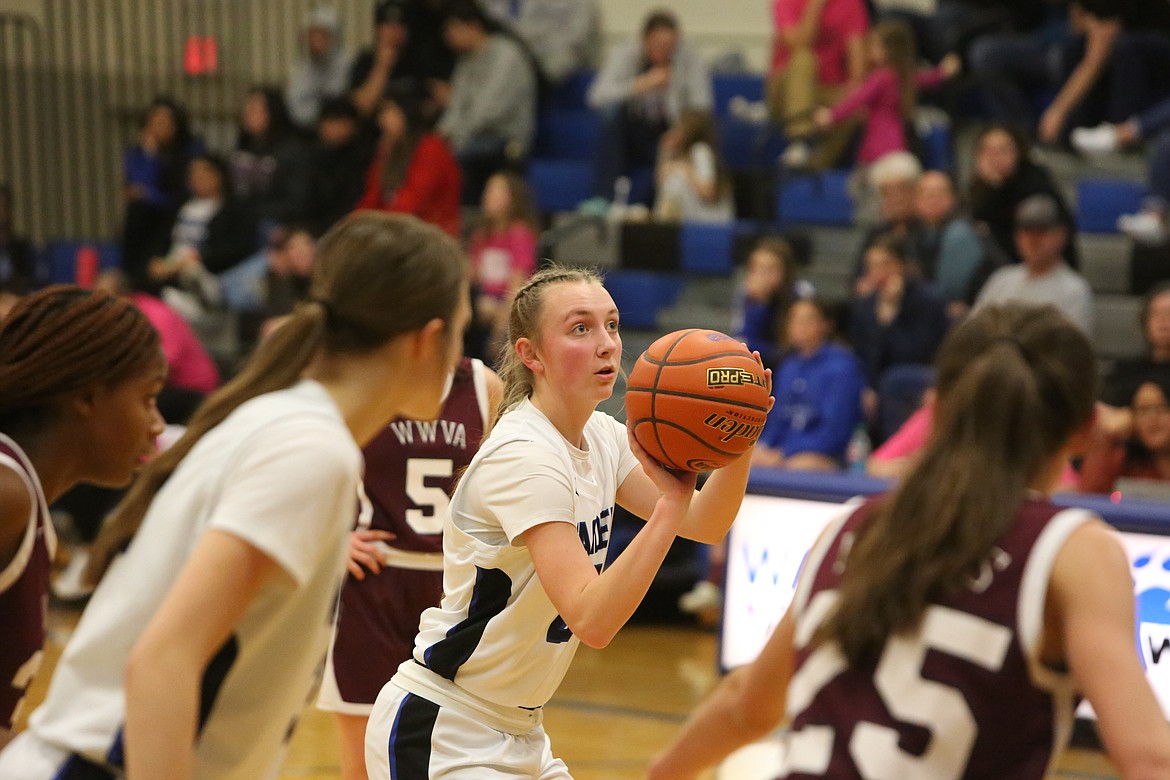 Warden junior forward Molly Sackmann shoots a free throw against Walla Walla Valley. The Lady Cougars won 64-23 over the Knights.