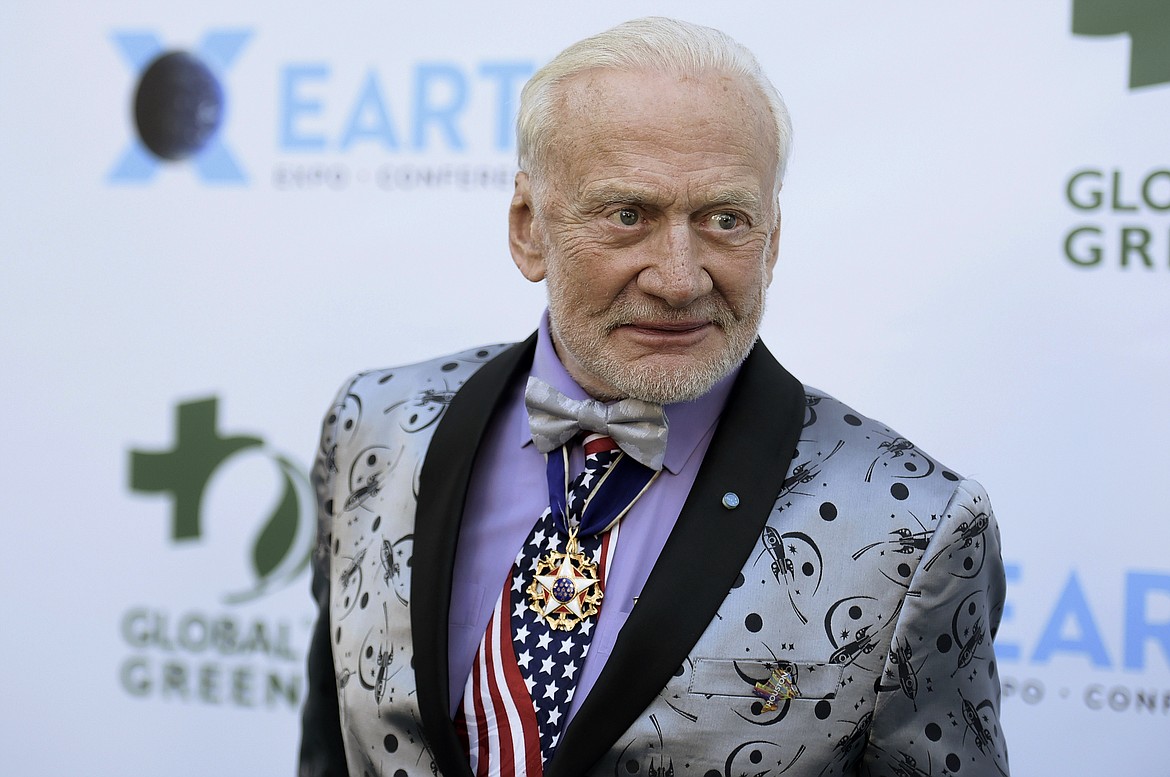 In a Wednesday, Feb. 28, 2018 file photo, Buzz Aldrin attends the 15th annual Global Green Pre-Oscar Gala, at NeueHouse Hollywood, in Los Angeles. Aldrin, who was one of the first people to walk on the moon, has married his “longtime love” in a small ceremony in Los Angeles. Aldrin wrote in a Facebook post that the wedding took place on Friday, Jan. 20, 2023 which was his 93rd birthday. (Photo by Richard Shotwell/Invision/AP, File)