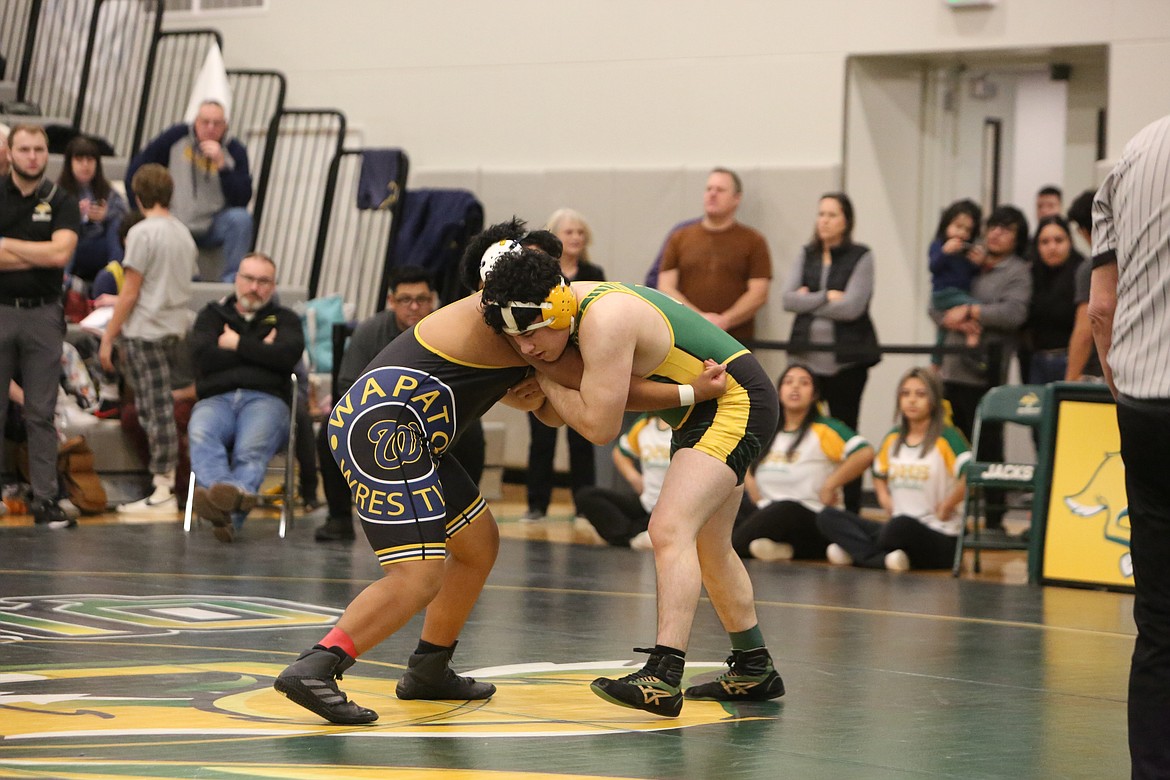 Quincy’s Christian Avila takes on Wapato’s Hassen Benedicto during the Quincy Mat Animal Invitational on Saturday. Local teams from Ephrata, Royal, Wahluke and Warden joined the Jackrabbits on their home mats.