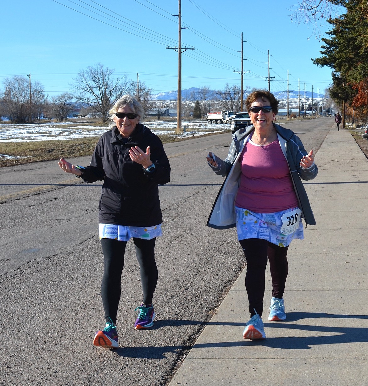 These pals were unapologetically strolling the Sorry Bout That route on Saturday. (Kristi Niemeyer/Leader)
