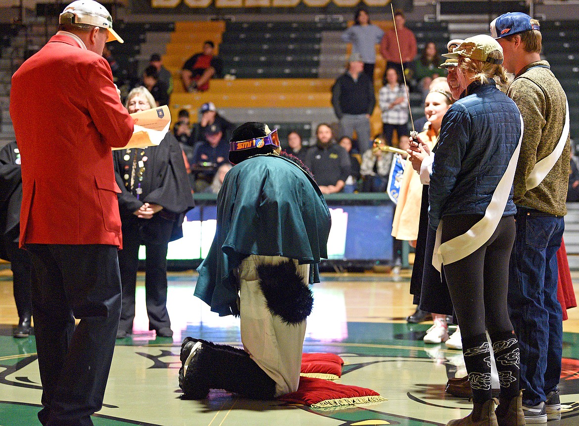 Whitefish Winter Carnival LXIV Princess Freya Colby Wharton is crowned alongside a disruptive yeti standing in for Prince Frey, Cole Pickert, who was unable to be at the ceremony Saturday at Whitefish High School. (Whitney England/Whitefish Pilot)