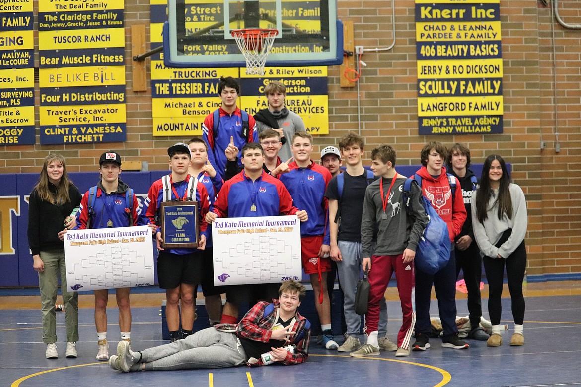 Members of the Superior wrestling team pose with their winnings after capturing the team title at the Ted Kato Invitational tournament this past Saturday in Thompson Falls. (Photo by Kami Milender)