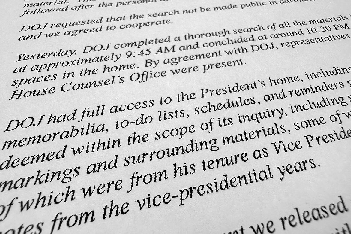 The statement by President Joe Biden's personal attorney Bob Bauer is photographed on Saturday, Jan. 21, 2023. Another search, this one by the FBI at Biden's home in Wilmington, Del., has turned up more documents containing classified markings. Bauer says in the statement that the Jan. 20 search overseen by the Justice Department lasted nearly 13 hours. (AP Photo/Jon Elswick, File)