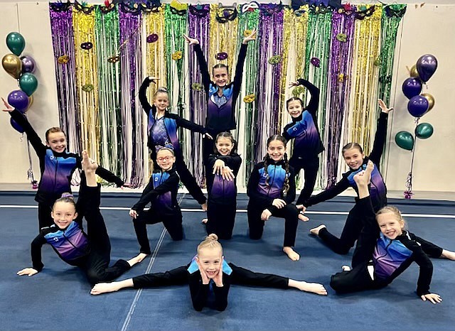Courtesy photo
GEMS Athletic Center Bronze team at the Flip Fest gymnastics meet Jan. 13-15 in Spokane. In the front is Skylar Bingham; second row from left, Ava Witman, Faith Robertson, Annabeth Gambrino, Katelyn Clark and Racine Dudley; and back row from left, Ani Hall, Riley Krebs, Nora Maddox and Selah Batchelder.