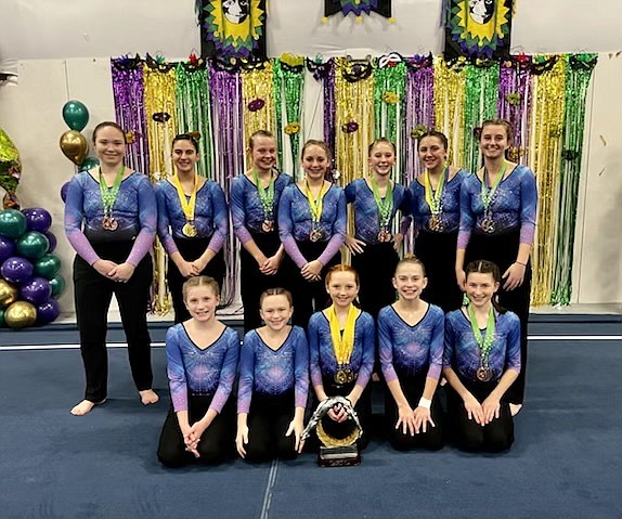 Courtesy photo
The GEMS Athletic Center Gold team competed at the Flip Fest gymnastics meet Jan. 13-15 in Spokane. In the front row from left are Macee Caudle, Sydney Burke, Elleah Hubbard, Saydee Mathews and Allie Netzel; and back row from left, Liz Phillips, Ariel Fahey, Kaylin Maloney, Arie Ferguson, Fynlie Reynolds, Laina Busicchia and Makenna Hillman.